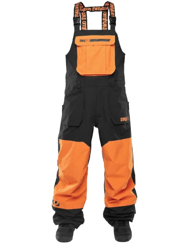 ThirtyTwo Basement Men's Snowboard Bib 2025 | Black/Orange